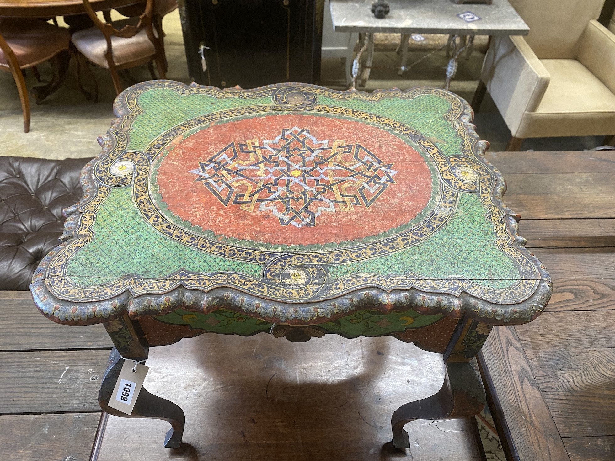 An Eastern European painted low occasional table, width 59cm, depth 46cm, height 57cm